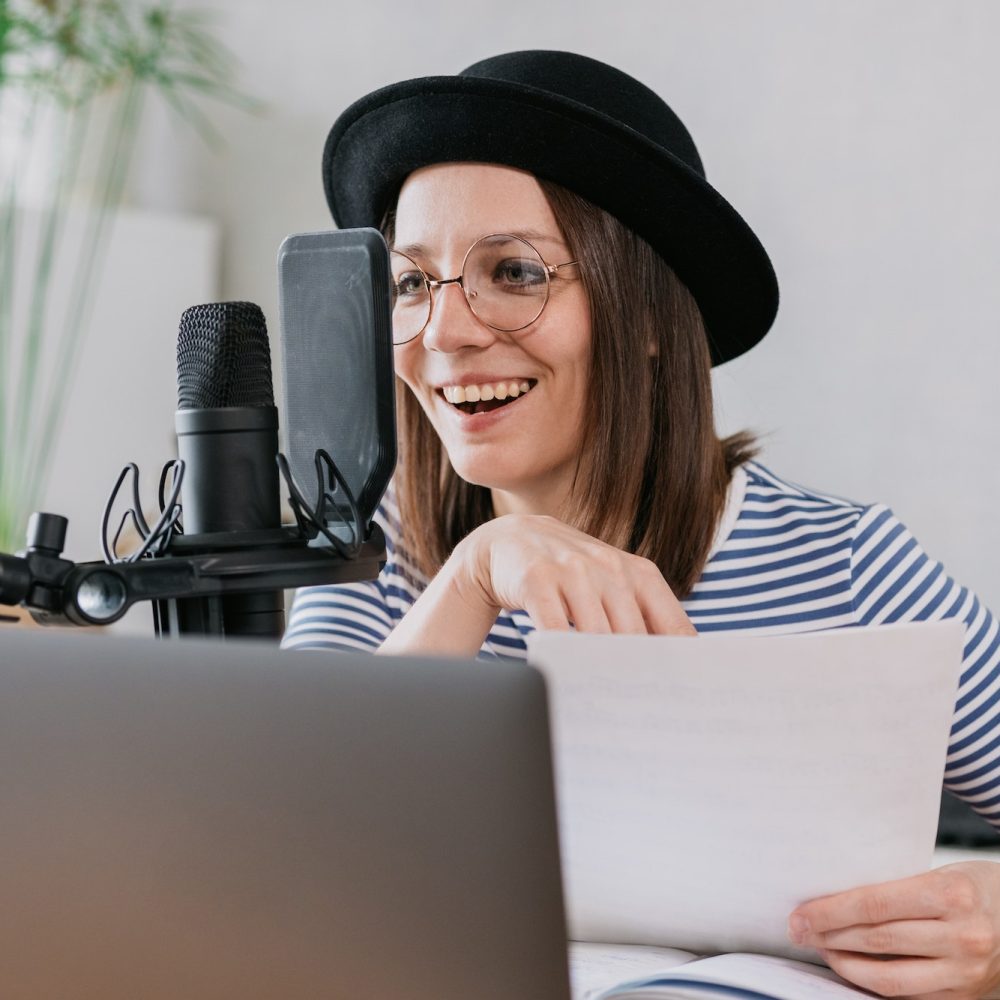 woman-with-microphone-and-headphones-in-recording-studio-recording-content-or-podcast.jpg woman-with-microphone-and-headphones-in-recording-studio-recording-content-or-podcast.jpg